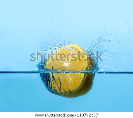 Lemon splash with blue background