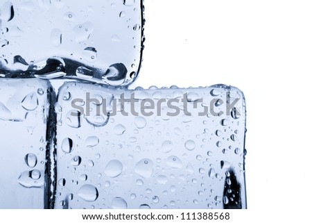 Ice cubes with water drops isolated on white