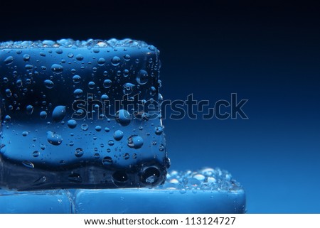 Ice cubes with water drops - abstract background