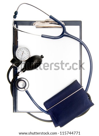 Empty document in a clipboard with sphygmomanometer and stethoscope isolated on white