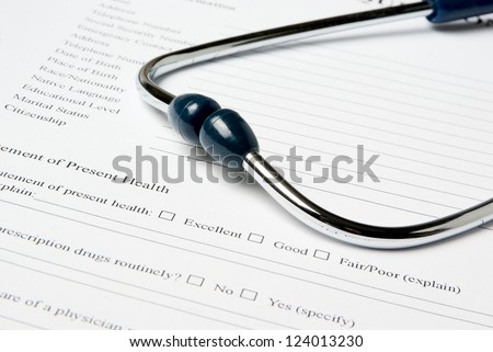 Stethoscope on medical document (medical questionnaire)