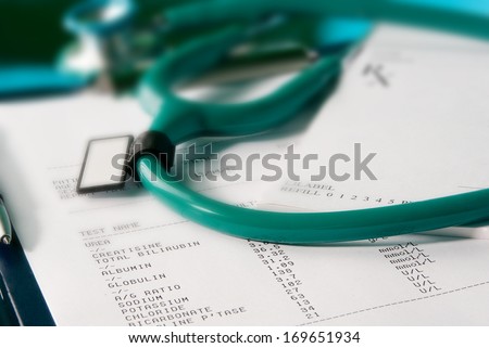 Medical documents (blood test and prescription) with a stethoscope on Xray photo of lungs
