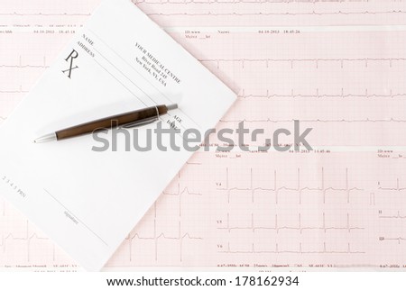 Empty medical prescription on electrocardiogram (ECG) chart