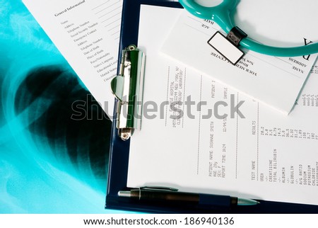 Medical documents (blood test, prescription and medical questionnaire) with a stethoscope on Xray photo of lungs