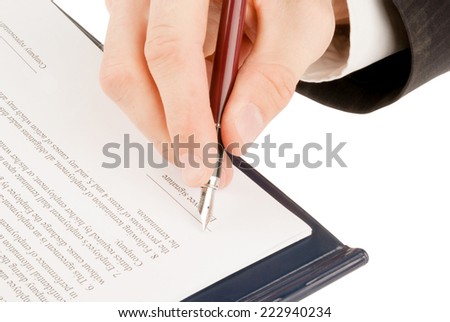 Businessman in suit signing the contract (agreement)