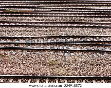 stripes of iron railways and brown gravel