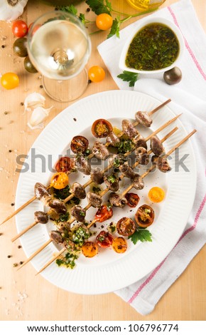 Chicken Hearts Grilled with Heirloom Cherry Tomatoes on Wooden Skewers