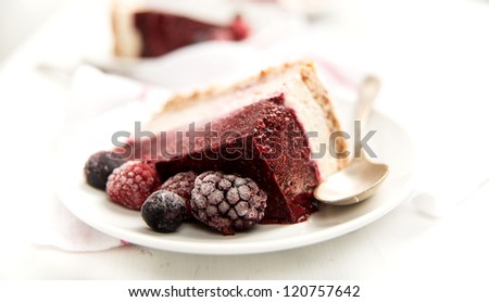 Healthy Dessert of Gluten Dairy Sugar Free Faux Cheese Cake with Dates Almonds Cashews and Frozen Mixed Berries