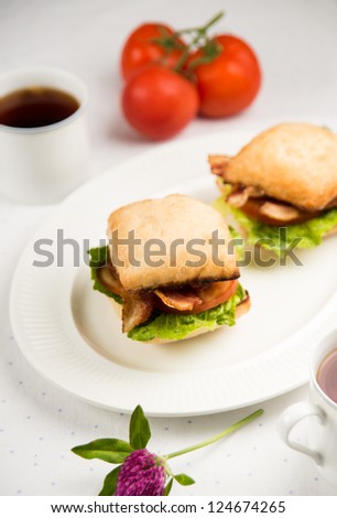 Small Breakfast Sandwiches with Bacon, Greens,Tomatoes and Coffee