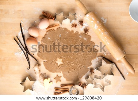 Ginger Cookies Dough With Ingredients and Star Cutters