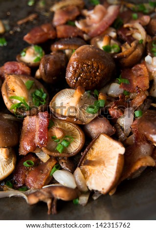 Bacon, Mushrooms and Herbs Cooked on Skillet for Dinner