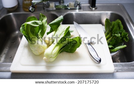 Bok Choy Cabbage Washed in Colander inside Sink
