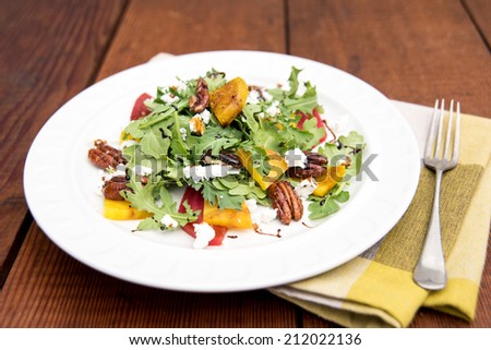Arugula and Beet Salad with Goat Cheese and Candied Nuts