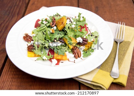 Arugula and Beet Salad with Goat Cheese and Candied Nuts