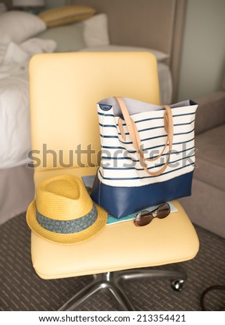 Striped Leather Tote Bag with Hat and Sunglasses for Vacation on Beach