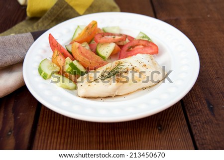 Wild Black Cod Fish Served with Fresh Cucumber and Heirloom Tomato Salad