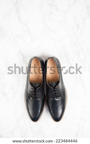 New Black Modern Oxford Shoes on Marble Background