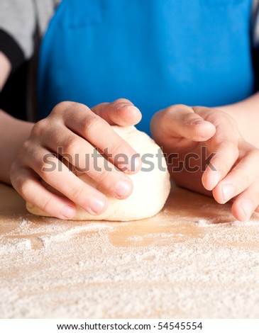 Hands Rolling Dough Ball