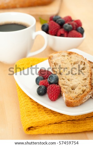 Two Pieces of Toast, Berries, and Coffee for Breakfast