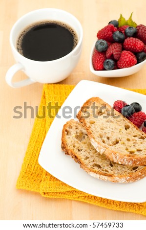 Freshly Brewed Coffee, Mixed Berries, and Slices of Wholegrain Bread for  Breakfast