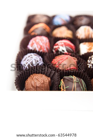 Various Gourmet Chocolate Truffles on White Background