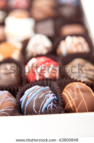 Assorted Gourmet Chocolate Truffles on White Background