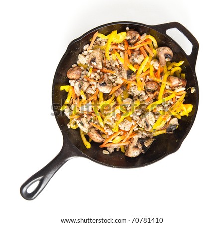 Sauteed Mushrooms, Bell Peppers, Carrots and Barley in Cast Iron Skillet