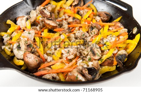 Sauteed Bell Peppers, Mushrooms and Carrots in Cast Iron Skillet