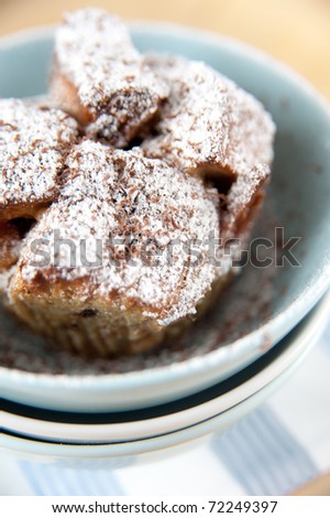 Raisin and Butter Bread Pudding Covered in Powdered Sugar