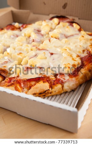 Canadian Bacon and Pineapple Pizza in Take Out Box