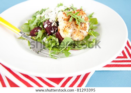White Fish Fried in Coconut Flakes and Served with Fresh Arugula and Beets