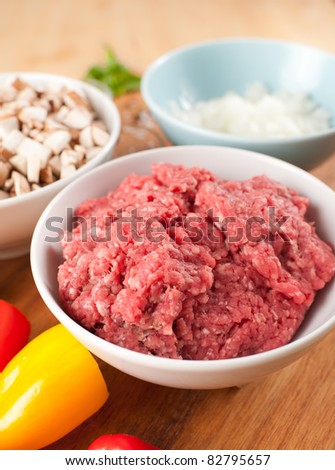 Raw Ground Beef and Other Ingredients to Cook Dinner