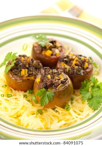 Ground Beef and Vegetables Stuffed Kumato Tomatoes Served on Spaghetti Squash