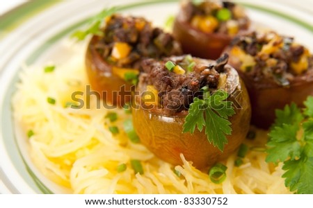 Ground Beef and Vegetables Stuffed Kumato Tomatoes Served on Spaghetti Squash