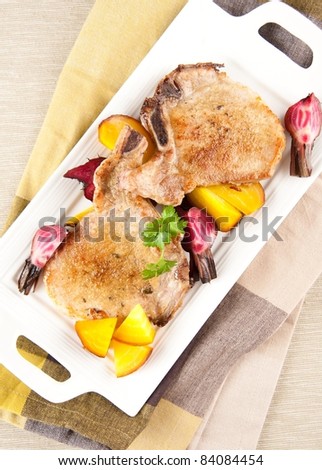 Two Pork Chops Served with Roasted Beets