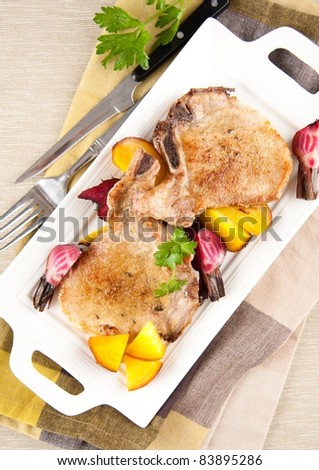 Two Pork Chops Served with Roasted Beets