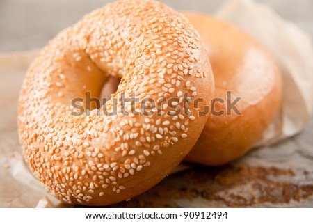 Freshly Baked Sesame Seed and Plain Bagels with Cream Cheese for Breakfast