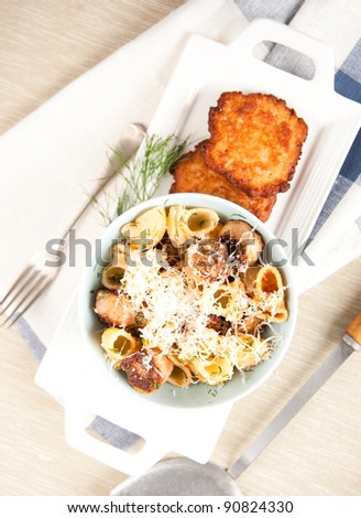 Organic Pasta Shells Served with Ground Beef, Cheese and Potato Pancakes