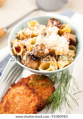 Organic Pasta Shells Served with Ground Beef, Cheese and Potato Pancakes