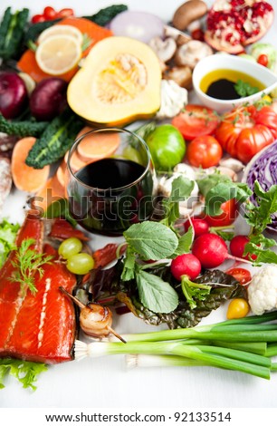 Healthy Food Assortment with Fish, Eggs, Vegetables, Fruit and Cured Meats for Healthy Diet full of Antioxidants and Vitamins