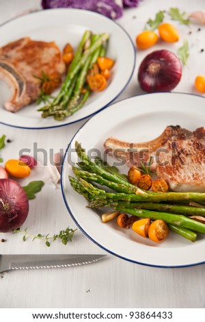 Grilled Pork Chops with Asparagus and Kumquat Oranges