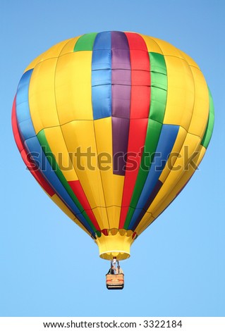A Shiny Colorful Hot Air Balloon in a Clear Blue Sky