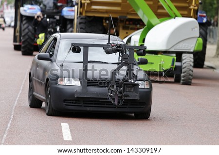 LONDON - JUN 23 : Car with front video recording movie camera at the \