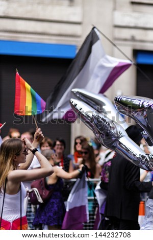 LONDON - JUN 29: The Gay Pride parade pictured on June 29th, 2013, in London. The Gay Pride 2013 in London, named Pride 2013, passed by Trafalgar square, where concert and events were organized.