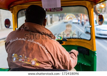 Bangalore, India - Jan 12 : cab driver pictured on January 12, 2014 in Bangalore City, India. The three-wheel taxi (called \