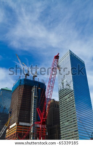 NEW YORK, NY - NOVEMBER 14: Cranes are working at the site of ground-zero to build new skyscrapers, on November 14, 2010 in New York. Ground-zero where the terrorist attacks took place on 11/09/01.