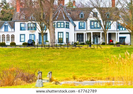 Historic Mansion in New Jersey during Winter. This manor along the Jersey shore hosted world war II battlefield cannons.