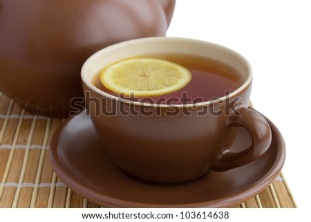 ceramic cup of tea with lemon