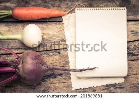 Empty Recipe Card  on Wooden Rustic Background with Fresh Vegetables. Warm Color Toned Image.