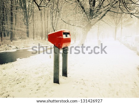 dutch red post box by winter
